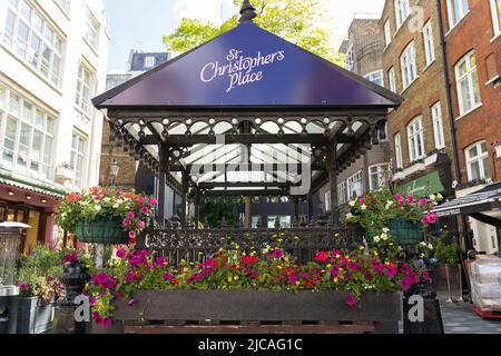 The outside dining areas of St Christopher's Place on Barrett Street in the daytime. London Stock Photo