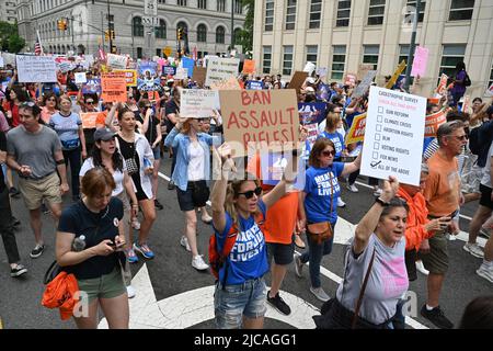 Demonstrators take part in the "March for Our Lives" protest on June 11, 2022 in New York. Stock Photo