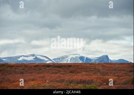 Snow covered mountain tops in Dovre Norway Stock Photo