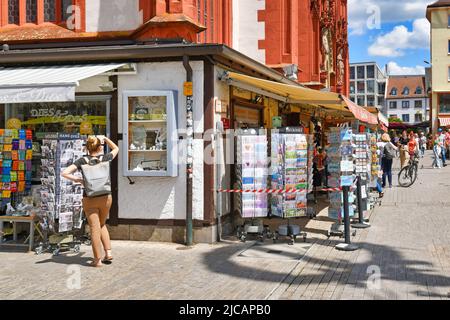 Würzburg, Germany - June 2022: Tourist souvenir shop at 'Marienkapelle' church located at market square Stock Photo