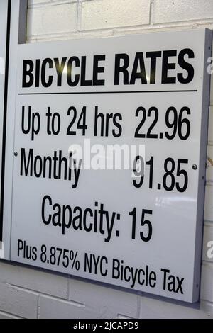 Parking Garage Bicycle Rates Sign in New York City, USA  2022 Stock Photo