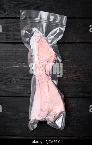 Orange roughy frozen pack fish meat set, with herbs, on gray stone ...