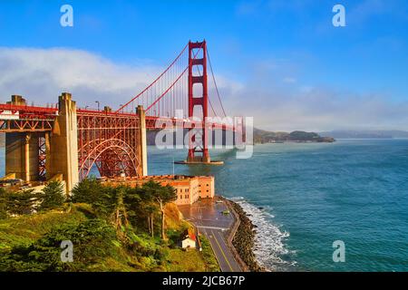San Francisco's iconic Golden Gate Bridge on foggy morning Stock Photo