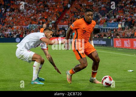 Rotterdam, Netherlands. 12th June, 2022. Steven Bergwijn of Netherlands with the ball during the UEFA Nations League, League A, Group 4 match between Netherlands and Poland at Feijenoord 'De Kuip' Stadium in Rotterdam, Netherlands on June 11, 2022 (Photo by Andrew SURMA/ Credit: Sipa USA/Alamy Live News Stock Photo