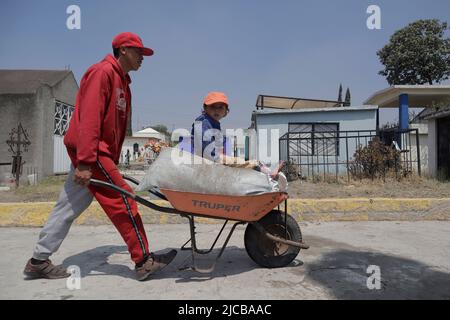 Mexico City, Mexico City, Mexico. 11th June, 2022. June 11, 2022, Mexico City, Mexico: Residents of San Francisco Tlaltenco, Tlahuac take part during a clean-up day inside the Tlaltenco Cemetery as part of the activities planned by neighbours ahead of the upcoming celebrations of the 800th anniversary of the founding of TlÃ¡huac. On June 11, 2022 in Mexico City, Mexico. (Credit Image: © Gerardo Vieyra/eyepix via ZUMA Press Wire)