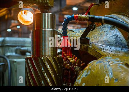 Processing helical gear with old modular hob machine tool Stock Photo