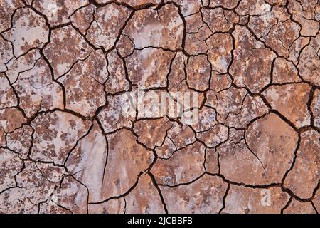 Texture asset of cracks in desert ground from above Stock Photo