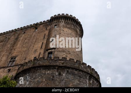 Naples, Italy. May 27, 2022. Corner tower of Medieval Castle: Castel Nuovo in Naples, Italy. Stock Photo