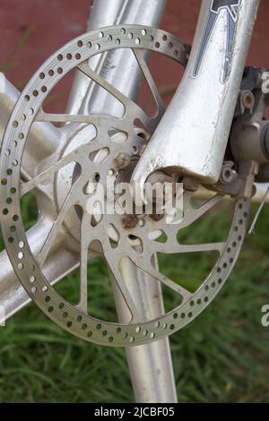 bicycle disk brake installed in front wheel Stock Photo