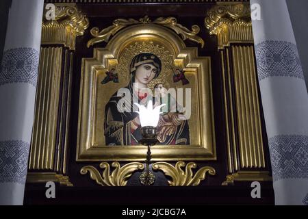 in church glowing image of St. maryi  which Jesus Stock Photo