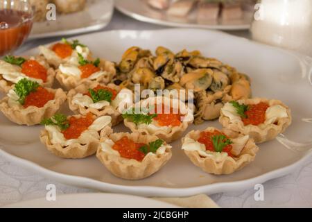 Restaurant red caviar on a table for a holiday Stock Photo