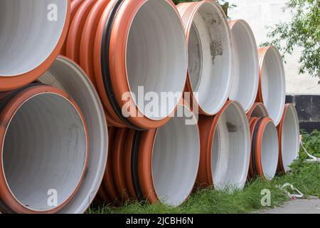 Specialized equipment for placing large diameter pipe in a trench Stock Photo
