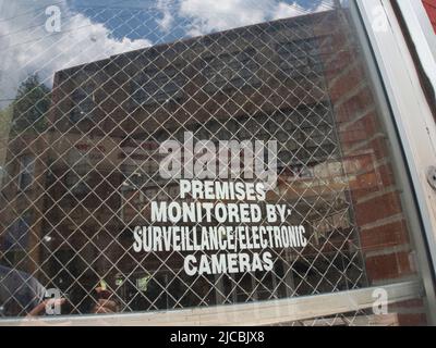 security warning sign on window Stock Photo