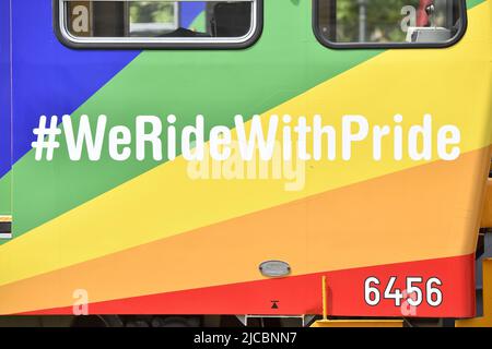 Vienna, Austria, 11th Jun, 2022. 26th Rainbow Parade over the Wiener Ringstrasse. Vienna tram in the colors of the rainbow Stock Photo