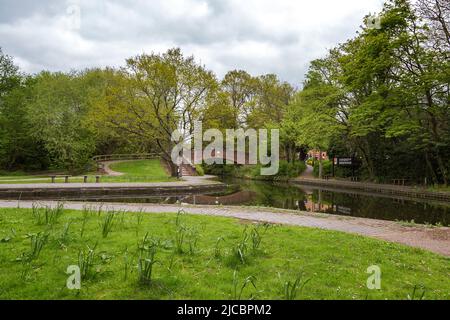 Picturesque view of a bridge crossing a canal at the University of Birmingham campus, England, United Kingdom. Stock Photo
