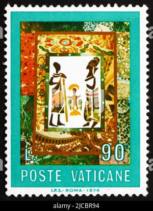VATICAN - CIRCA 1974: a stamp printed in the Vatican shows Nativity, African, circa 1974 Stock Photo
