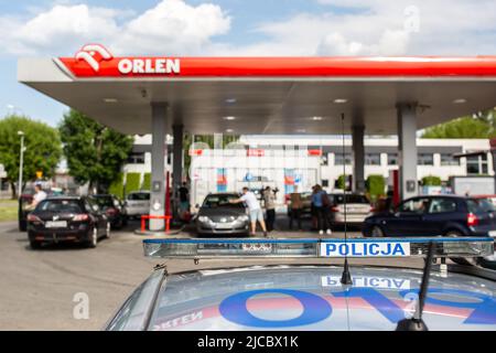 Poznan, Poland. 11th June, 2022. Police vehicle in front of 'Orlen' gas statnio during the drivers protest against high fuel prices. Credit: catwalkphotos/Alamy Live News Stock Photo