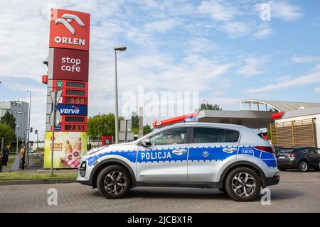 Poznan, Poland. 11th June, 2022. Police vehicle in front of 'Orlen' gas statnio during the drivers protest against high fuel prices. Credit: catwalkphotos/Alamy Live News Stock Photo