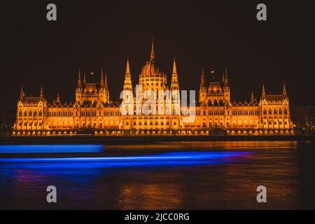 Hungarian parliament building from across the Danube river at night. Stock Photo