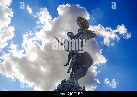 Kyiv, Ukraine - June 1, 2022: Fountain with a sculpture of Archangel Michael in the park Volodymyr Hill in Kyiv, Ukraine Stock Photo