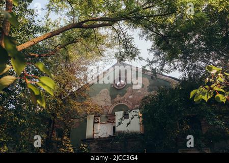 A fire on the roof of an old abandoned building. Stock Photo