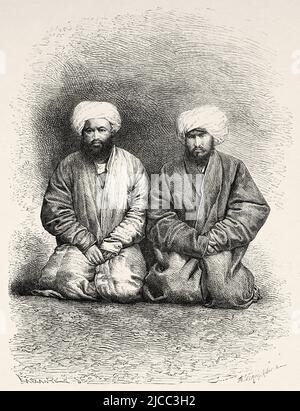 Two beggar men. Uzbekistan, Central Asia. From Orenburg to Samarkand 1876-1878 by Madame Marie Ujfalvy-Bourdon, Le Tour du Monde 1879 Stock Photo
