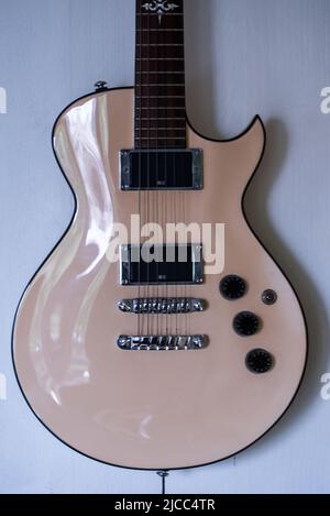 Den Helder, Netherlands, may 2022. The body of an electric guitar on white background. High quality photo Stock Photo