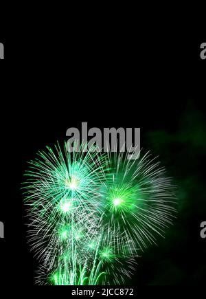 A scenic view of beautiful fireworks exploding in the skies of Doha ...