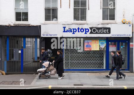 Computer Store Closed Pedestrians outside closed down computer shop, Tottenham Court Road ...