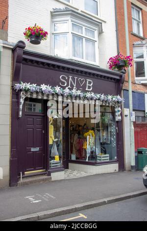 TIVERTON, UK - JUNE 30, 2021 branch of Snob clothing store on Gold Street Stock Photo