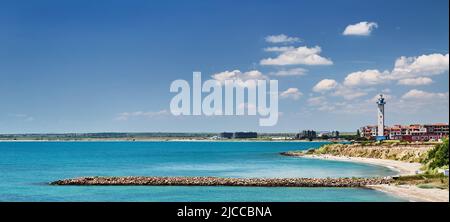 Black Sea coast of Bulgaria with sand beach, lighthouse and blue sky Stock Photo