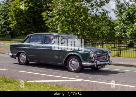 1967 60s sixties Green HUMBER HAWK Series VI driving during the 58th year of the Manchester to Blackpool Touring Assembly for Veteran, Vintage, Classic and Cherished cars. Stock Photo
