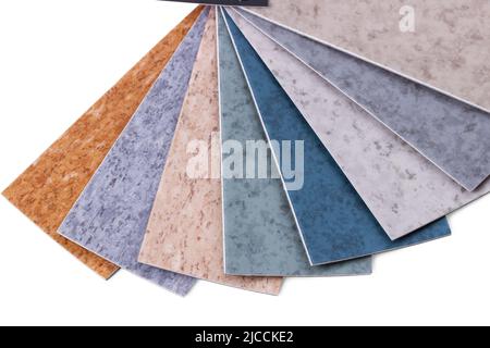 Opened layout with various flooring samples isolated on white Stock Photo