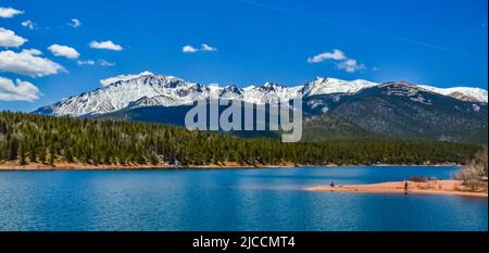 Pikes Peak panorama. Snow-capped and forested mountains near a mountain lake, Pikes Peak Mountains in Colorado Spring, Colorado, USA Stock Photo