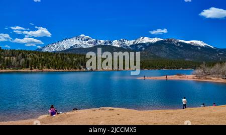 Pikes Peak panorama. Snow-capped and forested mountains near a mountain lake, Pikes Peak Mountains in Colorado Spring, Colorado, USA Stock Photo