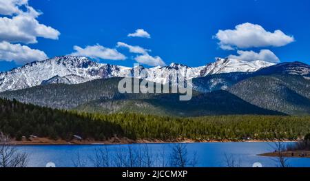 Pikes Peak panorama. Snow-capped and forested mountains near a mountain lake, Pikes Peak Mountains in Colorado Spring, Colorado, USA Stock Photo