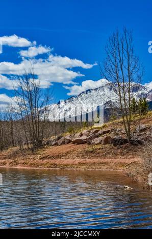 Crystal Creek reservoir near snow-capped mountains Pikes Peak Mountains in Colorado Spring, USA Stock Photo