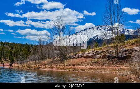 Crystal Creek reservoir near snow-capped mountains Pikes Peak Mountains in Colorado Spring, USA Stock Photo