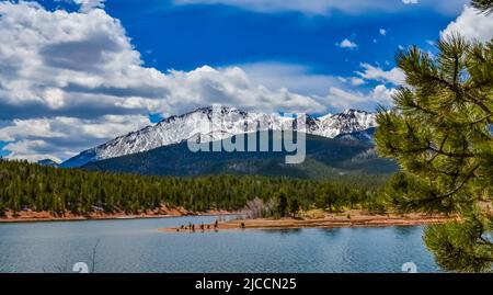 Pikes Peak panorama. Snow-capped and forested mountains near a mountain lake, Pikes Peak Mountains in Colorado Spring, Colorado, USA Stock Photo