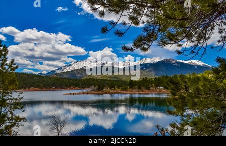 Pikes Peak panorama. Snow-capped and forested mountains near a mountain lake, Pikes Peak Mountains in Colorado Spring, Colorado, USA Stock Photo