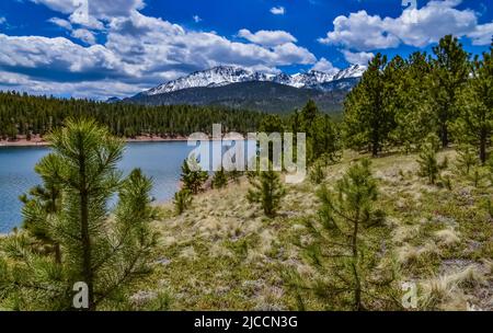 Crystal Creek reservoir near snow-capped mountains Pikes Peak Mountains in Colorado Spring, USA Stock Photo