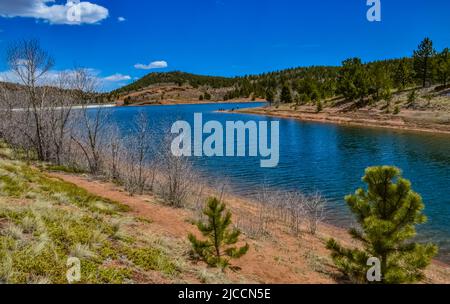 Crystal Creek reservoir near snow-capped mountains Pikes Peak Mountains in Colorado Spring, USA Stock Photo