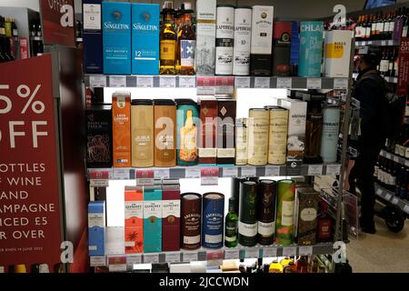 bottles of drinking spirits on shelf,waitrose supermarket,ramsgate town,east kent,uk june 2022 Stock Photo