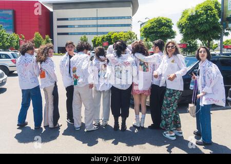 18.05.2022. Tbilisi, Georgia. students celebrating graduation and wearing white shirts for the Last Bell. High quality photo Stock Photo