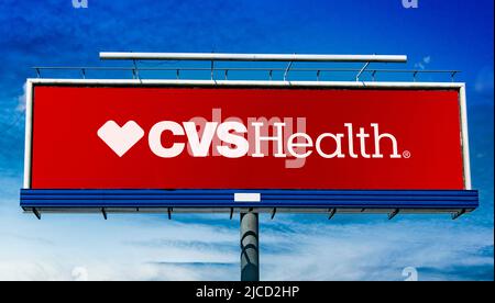Advertisement billboard displaying logo of CVS Health Corp Stock Photo ...