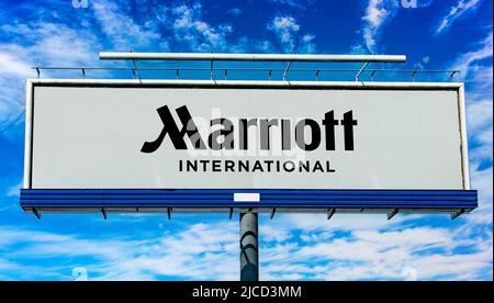 POZNAN, POL - MAY 1, 2022: Advertisement billboard displaying logo of Marriott Int., a company that operates, franchises, and licenses lodging includi Stock Photo