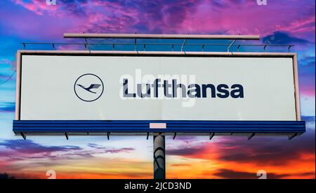 POZNAN, POL - MAY 1, 2022: Advertisement billboard displaying logo of Lufthansa, the flag carrier and largest German airline headquartered in Cologne Stock Photo