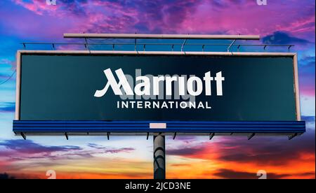 POZNAN, POL - MAY 1, 2022: Advertisement billboard displaying logo of Marriott Int., a company that operates, franchises, and licenses lodging includi Stock Photo