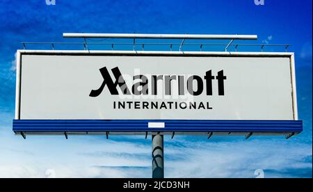 POZNAN, POL - MAY 1, 2022: Advertisement billboard displaying logo of Marriott Int., a company that operates, franchises, and licenses lodging includi Stock Photo