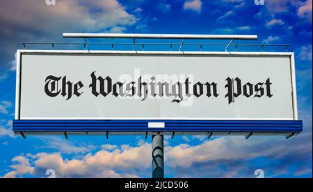 POZNAN, POL - MAY 1, 2022: Advertisement billboard displaying logo of The Washington Post, a major American daily newspaper published in Washington, D Stock Photo